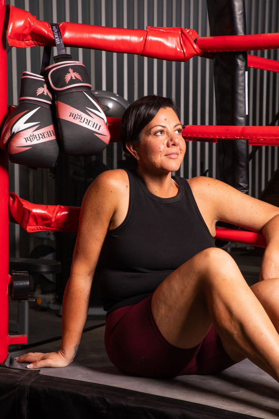 Women’s boxing gloves for women, post-training in a boxing gym